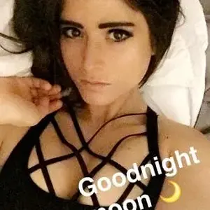 Spontaneous Nude with Her Ass in the Air and a Wink
