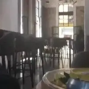 One Tit Out While Laughing and Biting Her Lip